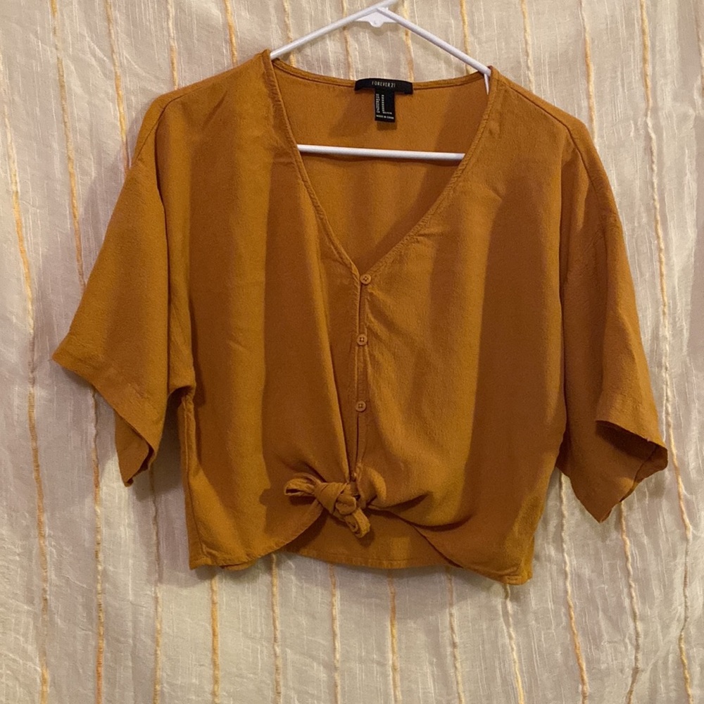 Gold/mustard/orange cropped tie front shirt. Forever 21. Size Medium.